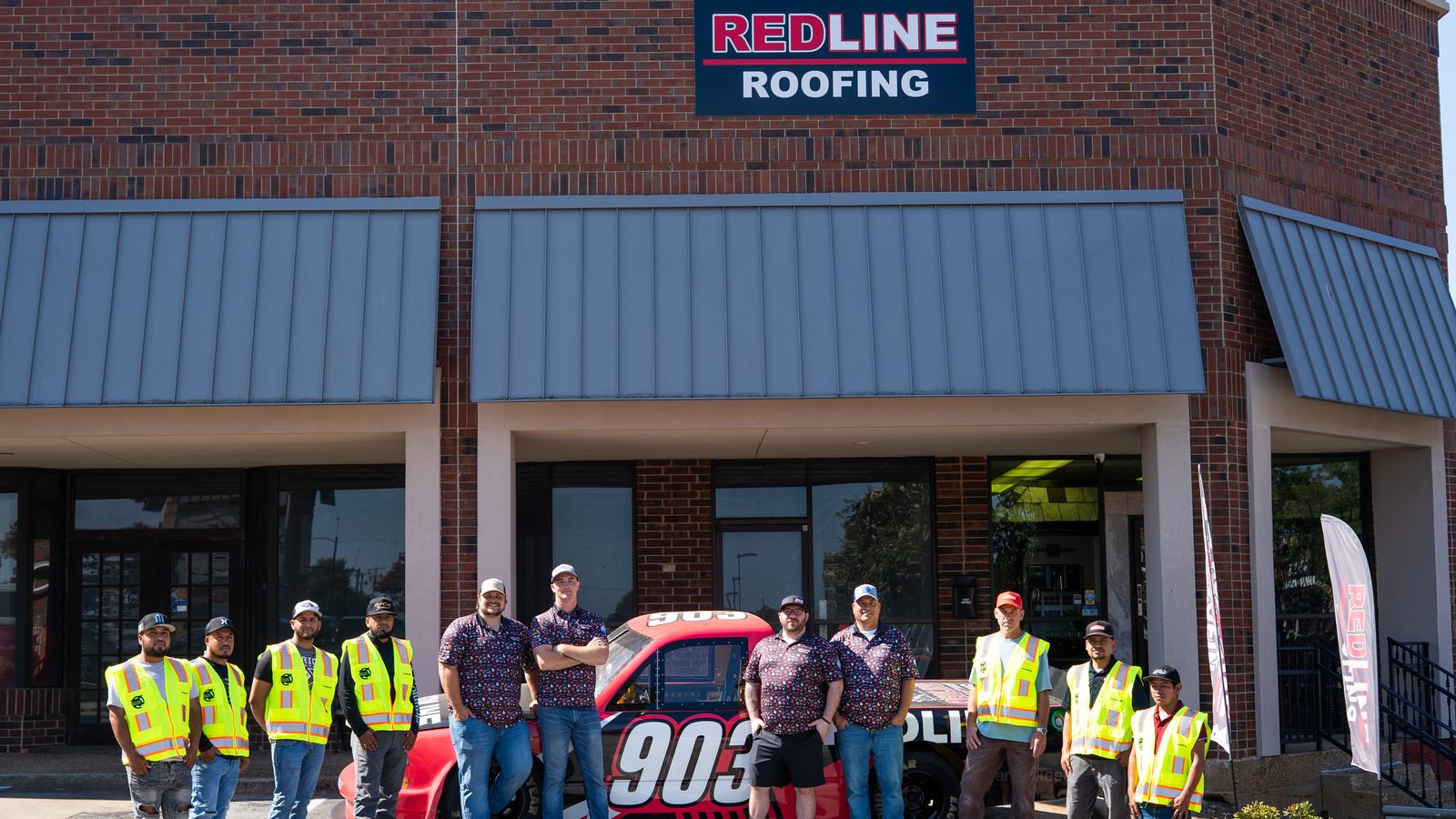 The Redline Roofing team outside the company office in East Texas