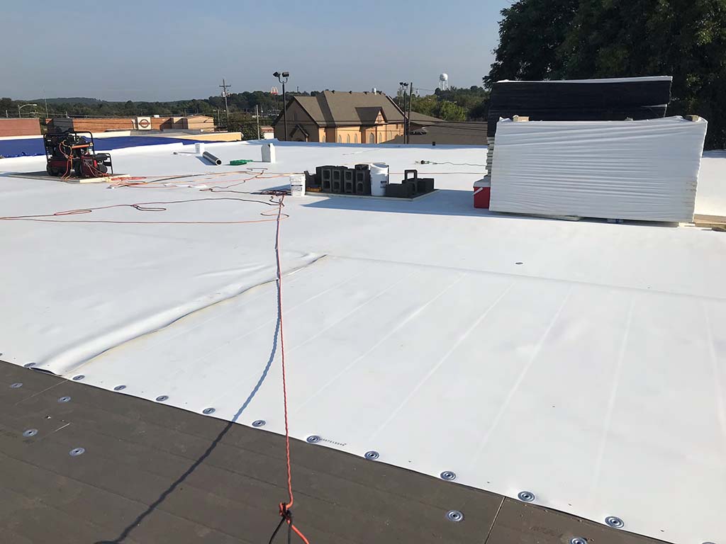 PVC flat roofing installation by Redline Roofing