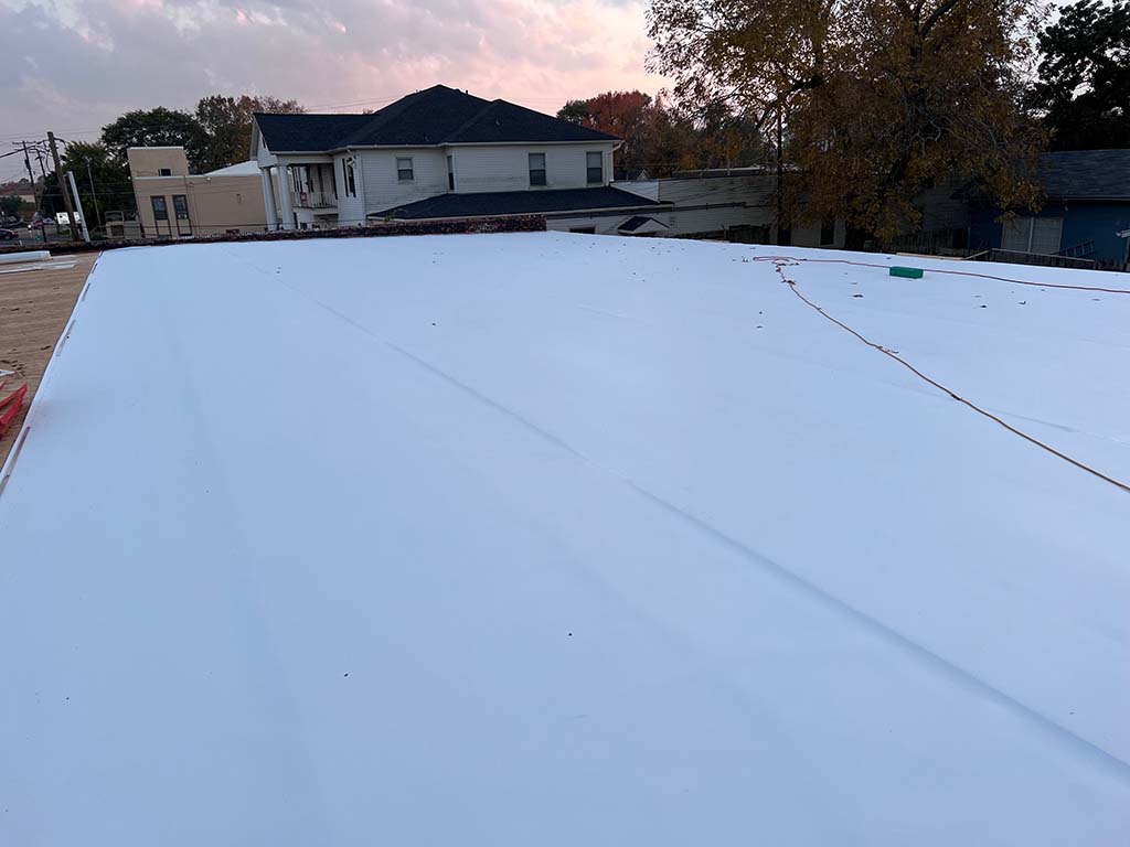 PVC flat roofing installation by Redline Roofing