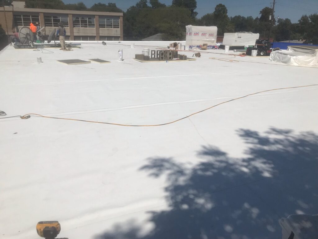 PVC flat roofing installation by Redline Roofing