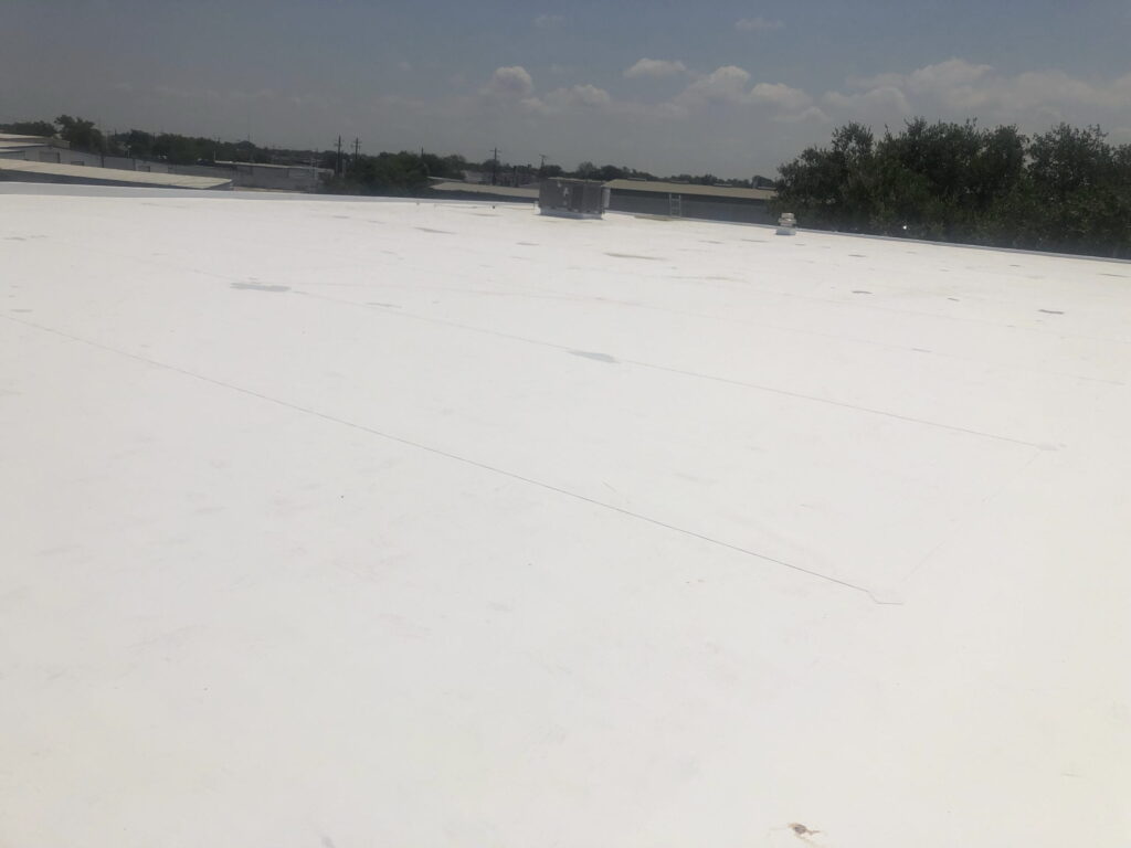 PVC flat roofing installation by Redline Roofing
