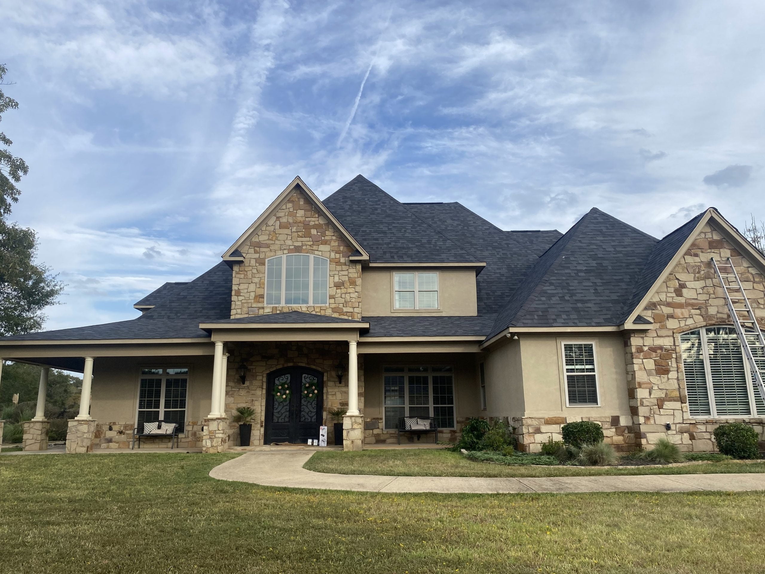 Residential shingle roof replacement in Tyler, TX by Redline Roofing